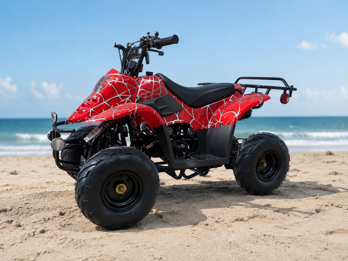 Ventra Puff P110 110cc kids all-terrain vehicle on a beach